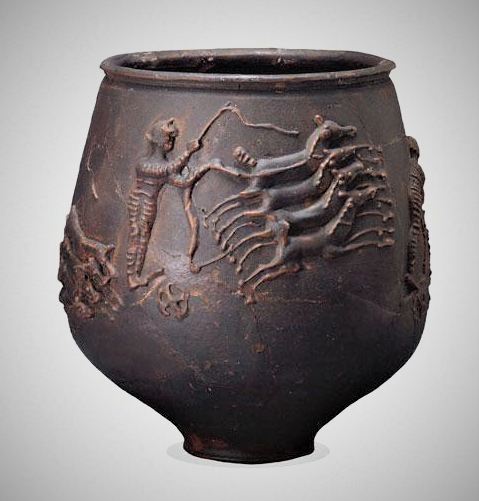 TrimontiumTrust's tweet photo. A #Roman vase found in Colchester, Essex, England and dated to the 2nd Century AD. It is thought to have been made locally and has been decorated with a striking design showing a chariot race, a quadrigae with four-horse chariots, &amp; four competitors shown - now in @britishmuseum https://t.co/ZBU3lczyUB