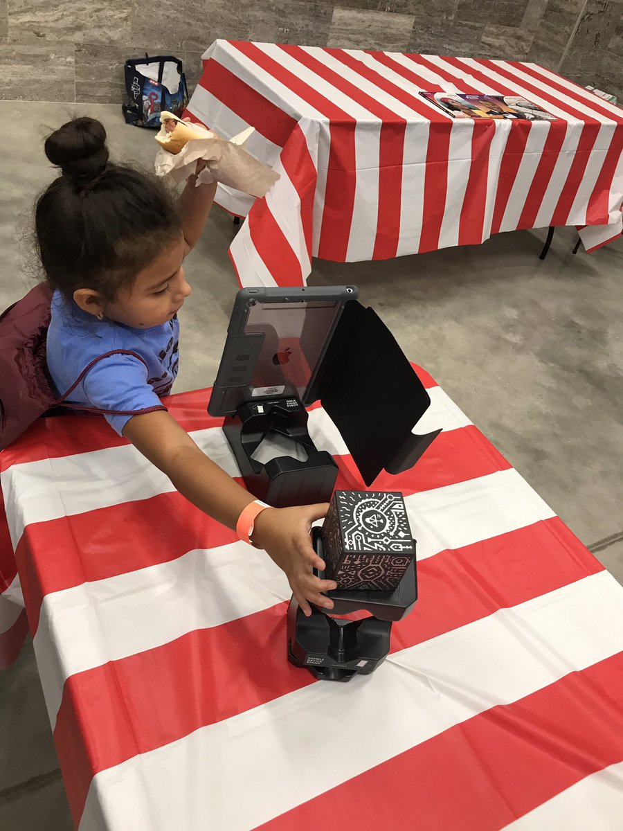 maker_maven's tweet photo. How many hands do you need to interact with the @MergeVR #augmented reality cube? Just one! The other hand is for your hotdog 😂😂😂 @MagnoliaISD @anihebert #magnolialibraries #steam #txchat https://t.co/ytOGaZ3EEO