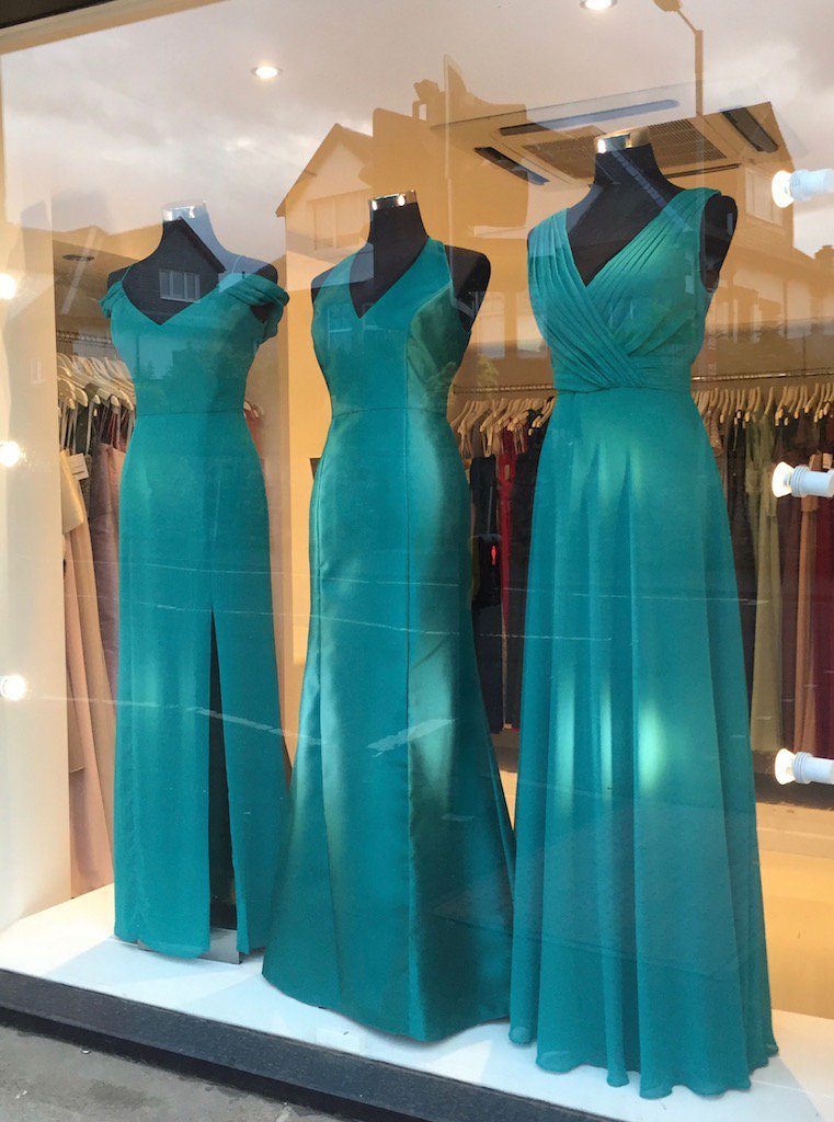 Our beautiful bridesmaids in Jade. With over 200 styles in store, call 0141 644 1453 to book your appointment.