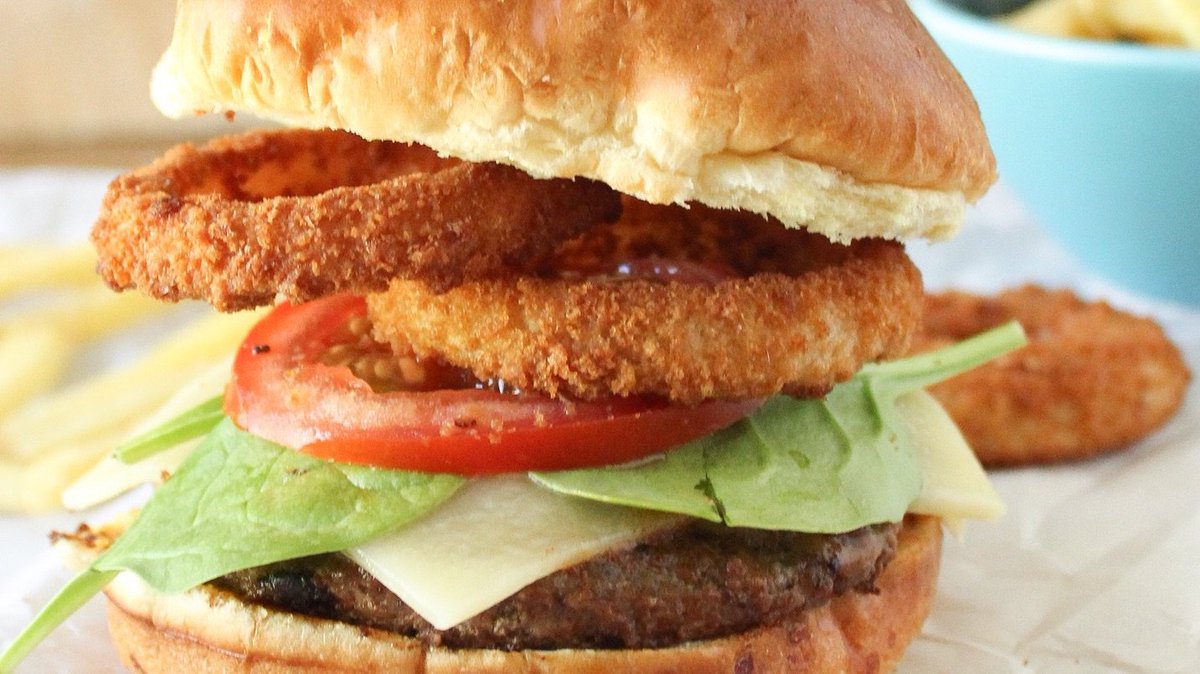 A burger with a side of onion rings makes the perfect duo. This Crispy Onion Rings Cheeseburger takes it to a whole new level of flavor! Especially today, on #NationalOnionRingsDay. turano.com/product/crispy…