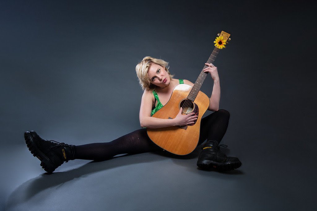 DAFComedyFest's tweet photo. Tessa Skara styles herself "the Courtney Love"  and "Rock Goddess" of comedy, and those titles are earned. She has appeared on HBO and Amazon. Her sketch shows and musicals have gone up at UCB and several festivals. Queen Tessa will be headlining Block D: June 28th at 8 PM! https://t.co/xpa8SvNFlO