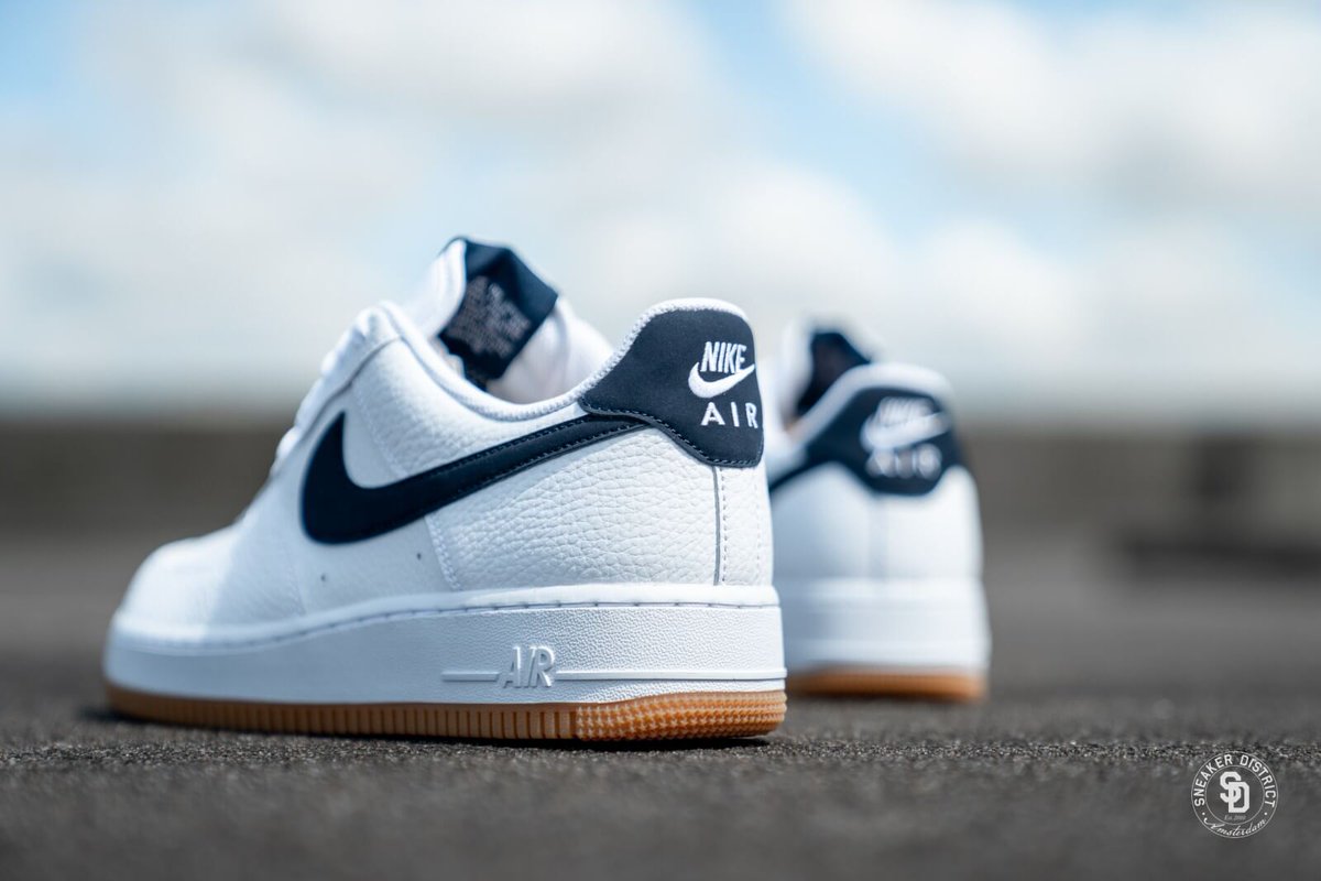 nike air force 1 with navy swoosh and gum sole