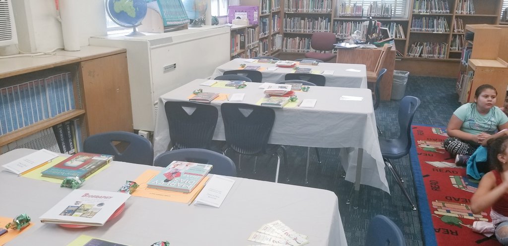 librarianmullen's tweet photo. @northernparkway they were so excited for their genre dinner party. These students worked hard studying the various genres. They left with a treat and a list of books to read over the summer. #slcsummer #readingforpleasure #schoolisfun https://t.co/SIFjNkknMe