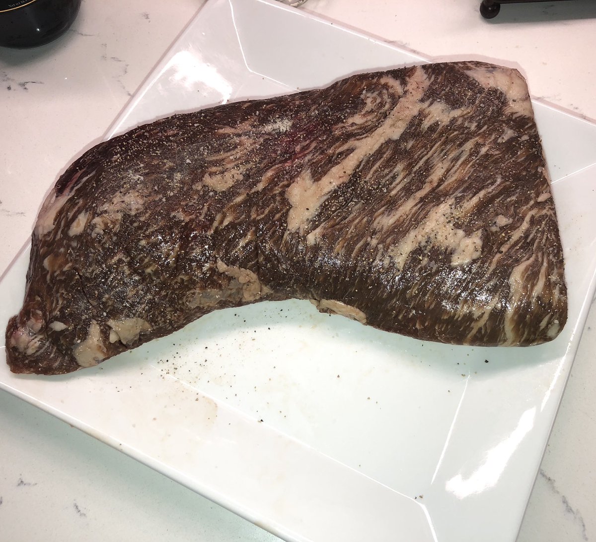 MarkPuente's tweet photo. In 2.5 hours we should be able to taste the difference between a prime-grade tritip versus a Kobe tritip. This Kobe has excellent marbling. I’ve never cooked one before. You know that saying: Fat is your friend. #bge #bigreenegg #kobe #kobebeef #tritip https://t.co/GQa8SxH9D2