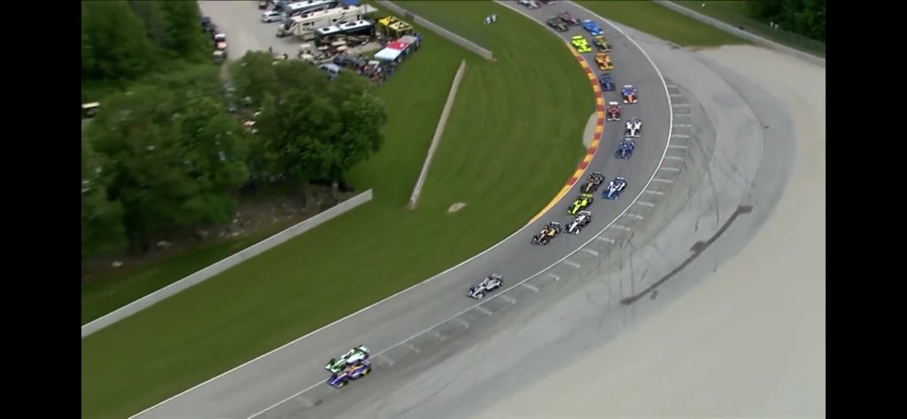 _THRacing's tweet photo. @SkySportsF1 Lap 1, 1st corner Indycar at road america last night. Rossi around outside. 4 wheels off for the lead. Great racing, no penalties. https://t.co/CWltdDBaSZ