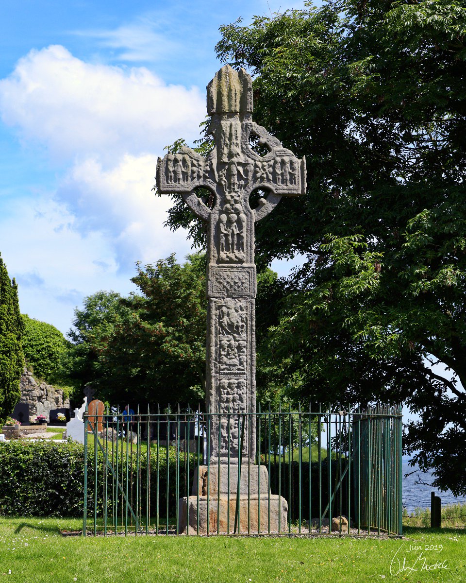 In a Country Churchyard |

Beneath those rugged elms, that yew-tree's shade,
Where heaves the turf in many a mouldering heap,
Each in his narrow cell for ever laid,
The rude forefathers of the hamlet sleep...
-Thomas Gray

Ardboe Cemetery and High Cross in rude health.