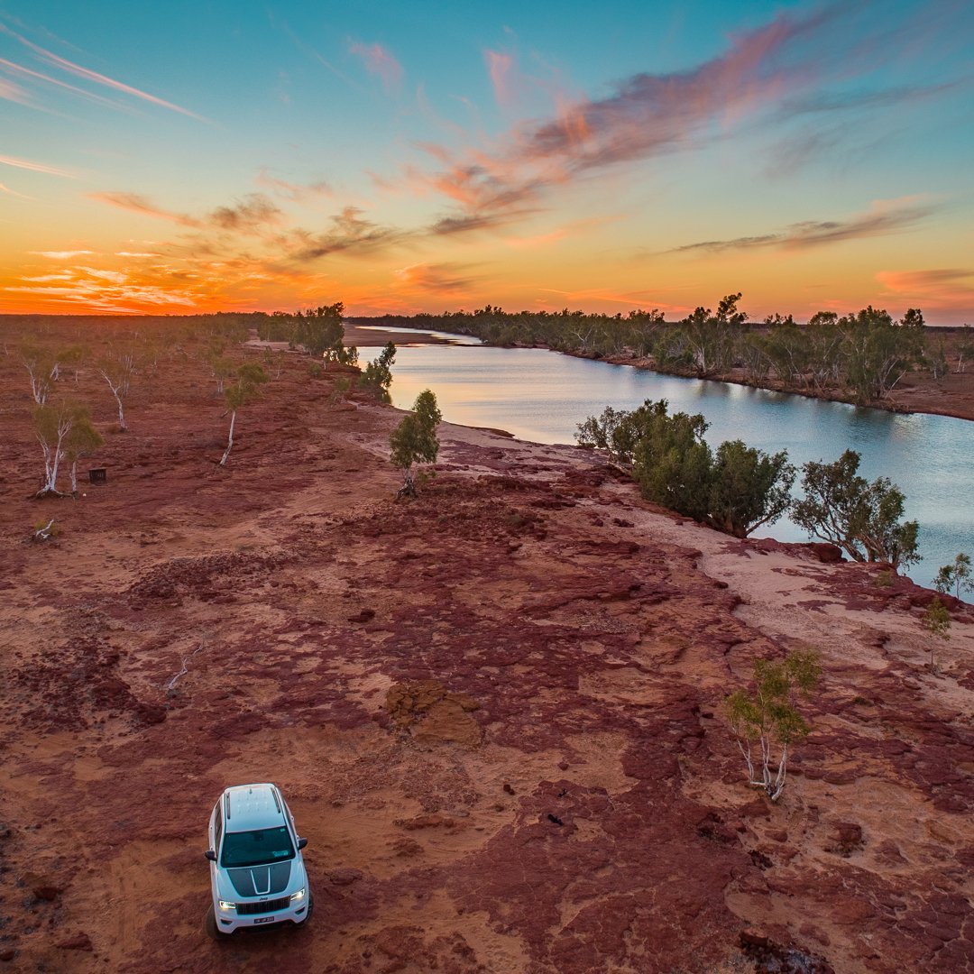 WestAustralia's tweet photo. Witness this amazing golden hour as you enjoy the nature at #RockyPool ☀️! The glowing horizon shining its light on @thecoralcoast's picturesque landscape is a sight not to be missed. Time to pack a picnic and be at one with nature here! (via IG/parky.au) #justanotherdayinWA https://t.co/tsPZS8CVXk
