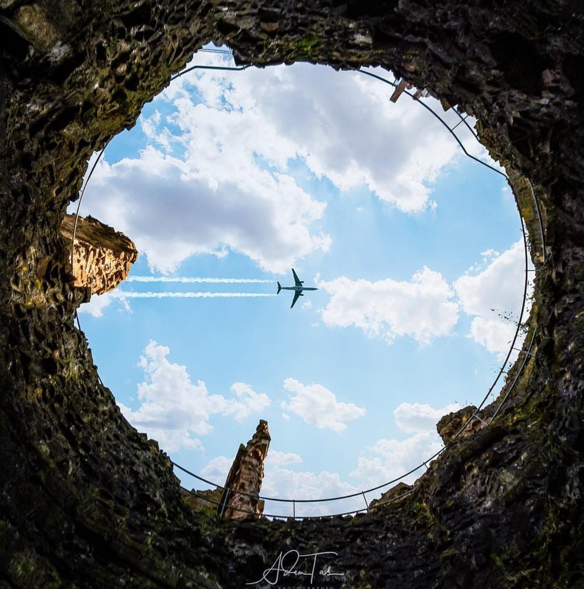 🏰 Awyren trwy twr Castell Fflint | Plane flying over Flint Castle 📸 image by instagram.com/adam_tas #FindYourEpic #NorthEastWales #DiscoverNorthWales