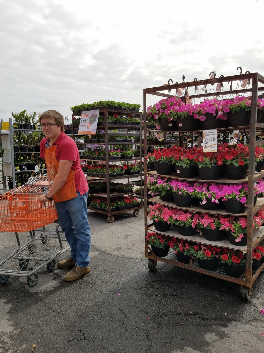 SoniaStocking's tweet photo. Hanging baskets are flying off the racks! Grilling for our associates and customers! #letsdothis #trendingorange @SupercuseDM https://t.co/pdnSyJwCGc