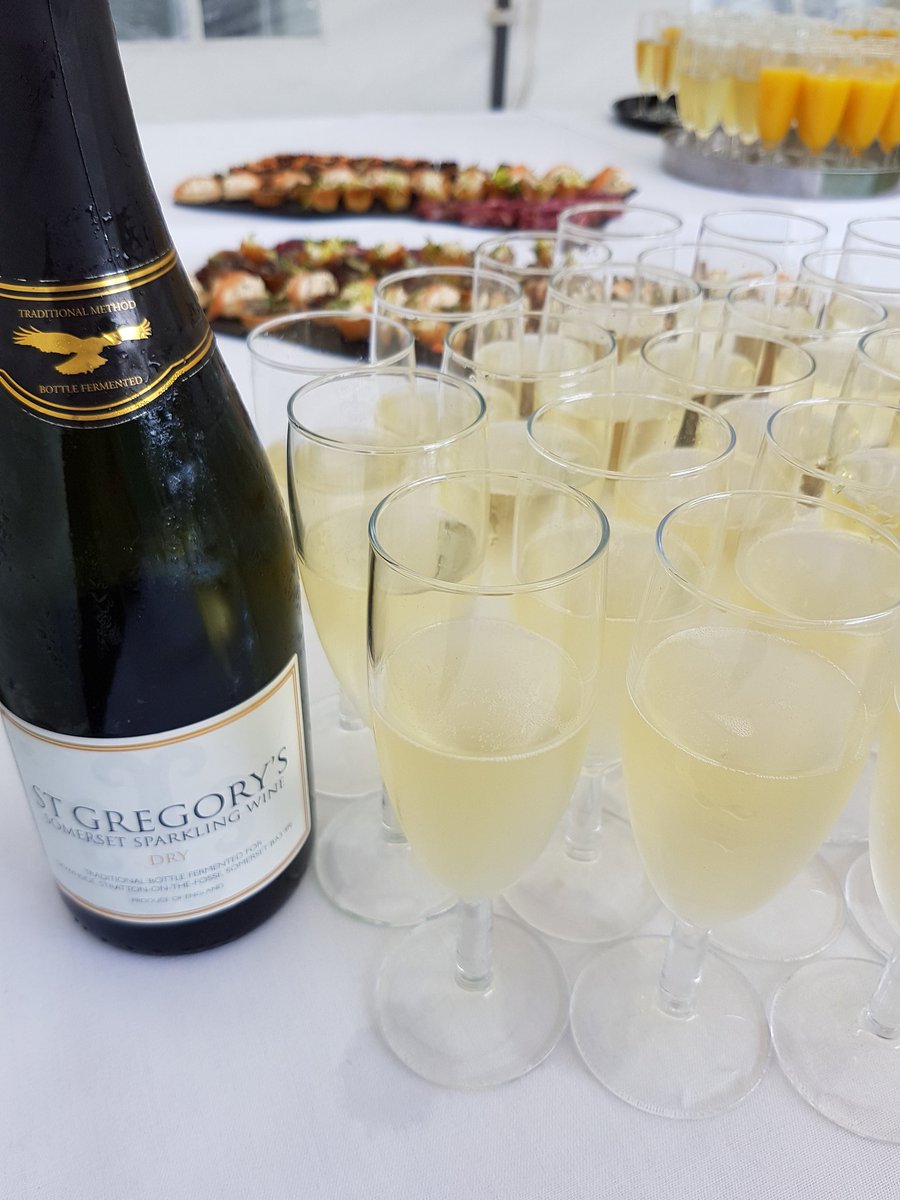 DownsideFood's tweet photo. The sun came out just in time for the drinks reception with canapes for Prize Day #amazingfood #champagne   @downsideschool @HolroydHowe https://t.co/w2mUwbQVGW