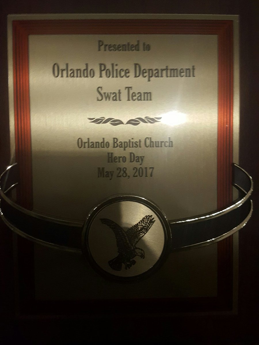OrlandoPolice's tweet photo. OPD SWAT receives Hero Day Award for the dedication and support of this community. https://t.co/pDAxTnZxw1