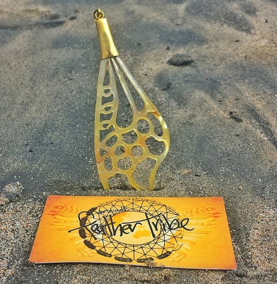 FeatherTribe's tweet photo. Golden Pearl #Fairy #Wing #Shell Pendant Necklace with Brass https://t.co/e19Tyaigfl https://t.co/GntNQrJwam