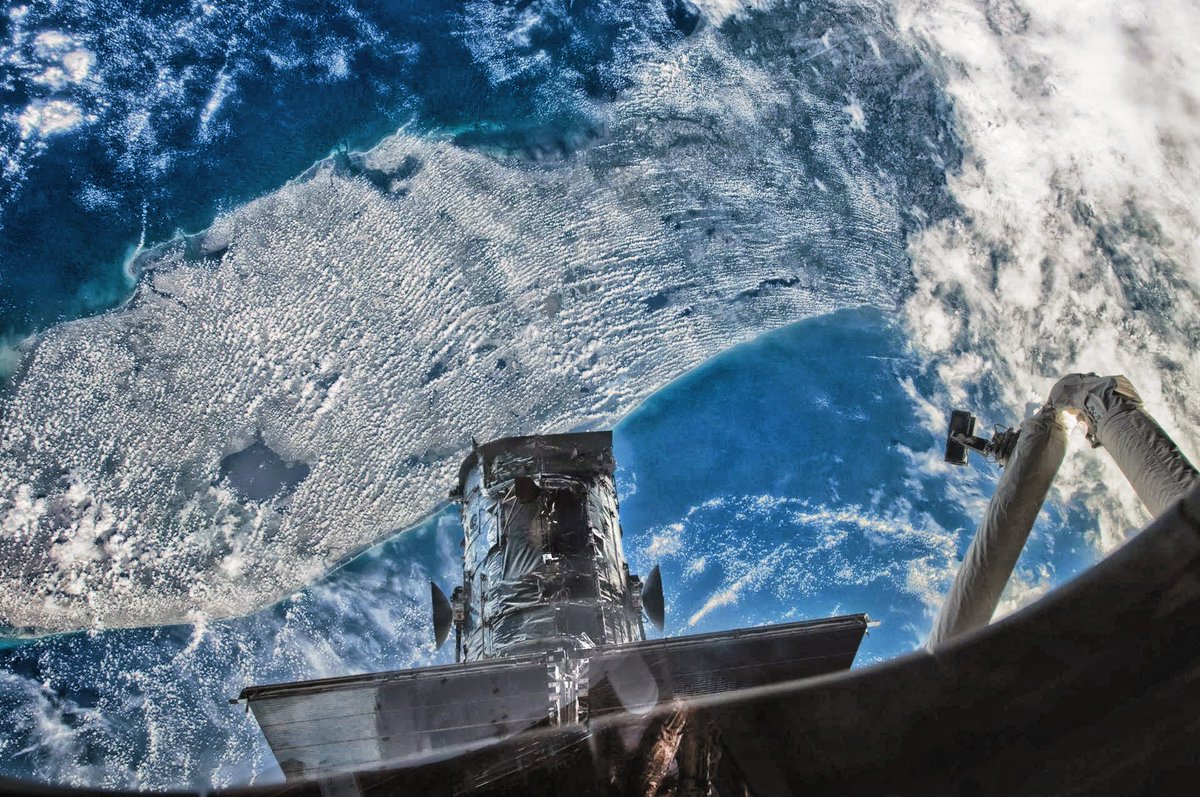 Processed photo of the Hubble Space Telescope over Florida on May 17, 2009 during reservicing by STS-125 Atlantis (NASA image S125-E-008618)