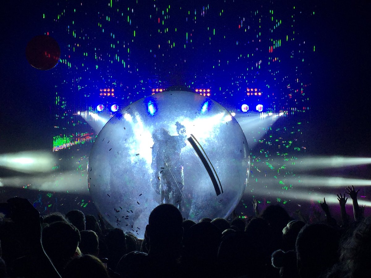 Watching <a href="/waynecoyne/">Wayne Coyne</a> take his hampster ball out for a roll as <a href="/theflaminglips/">The Flaming Lips</a> perform a beautiful rendition of David Bowie's "Major Tom".