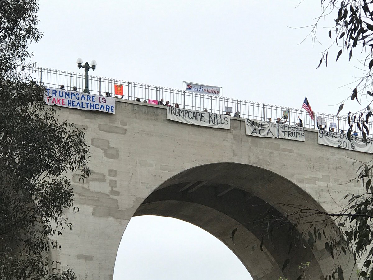 SDIndivisible's tweet photo. @DarrellIssa @rachaelmbade After @DarrellIssa sold us out w/ his #AHCAVote we were in #BalboaPark letting everyone know it was #GameOverGOP especially for #TrumpsChump https://t.co/50GwNAKClO