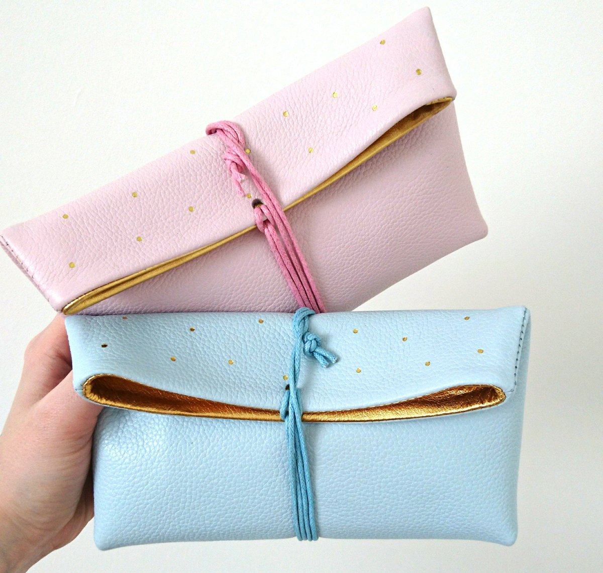 designeightyone's tweet photo. More #Nulku clutch bags in stock, including these pale blue and pale pink beauties! #NordicDesign https://t.co/OcGgUSGb4W