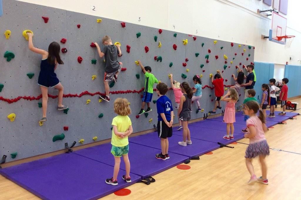 Lots of excitement as McKinley students break in the new climbing wall. A great way to increase muscular strength.