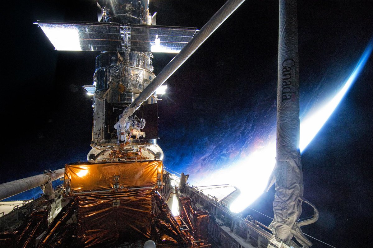 Processed photo of NASA astronaut Michael Good working on @NASAHubble during STS-125 on May 17, 2009 (NASA image S125-E-009194)