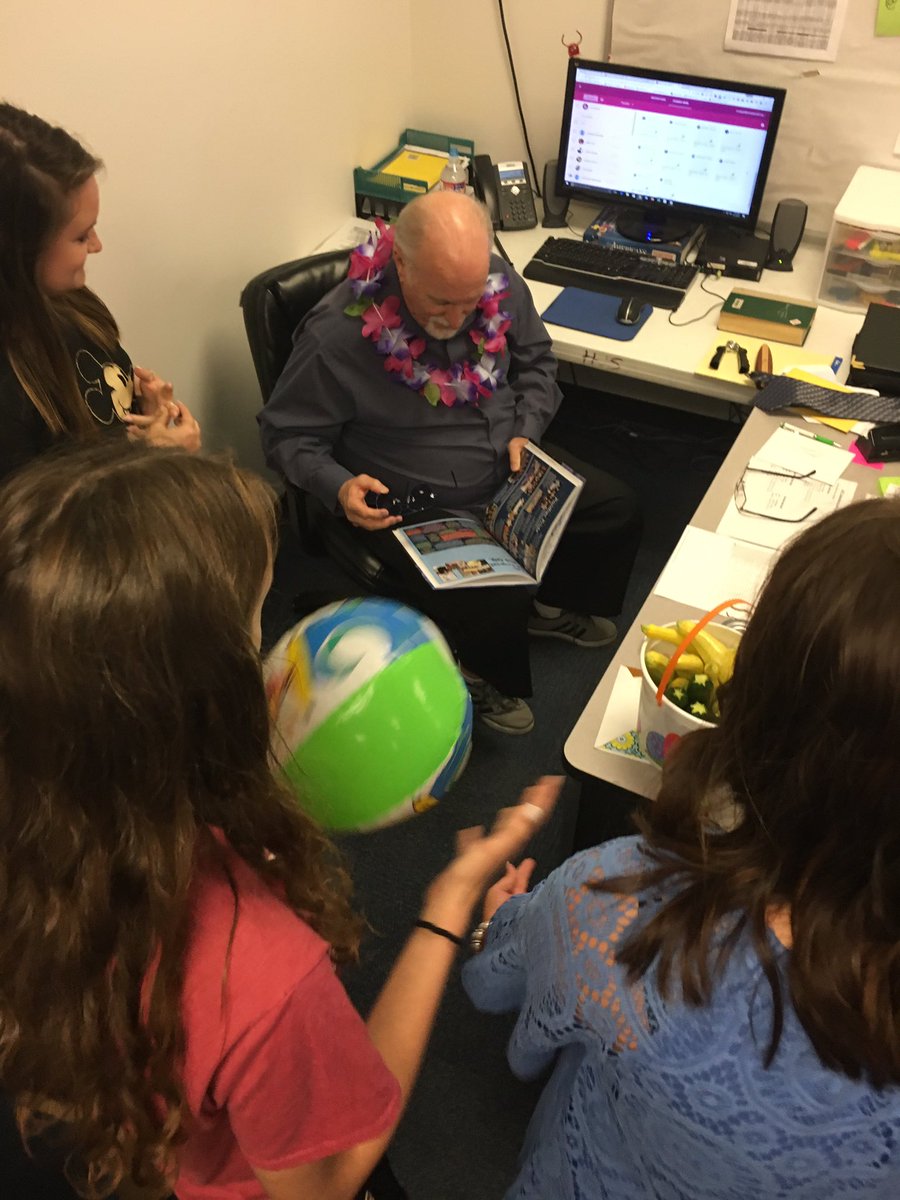 Ms_Strubell's tweet photo. My yearbook students made a dramatic entrance to give Mr. Campbell their gift! We love you, and will miss you so very much! #VAHSpride https://t.co/V2KOUcCplD