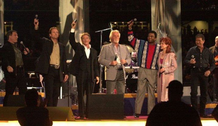 With Larry Gatlin and the Gatlin Brothers, Charley Pride, Naomi Judd, and Mac Davis in 2002.