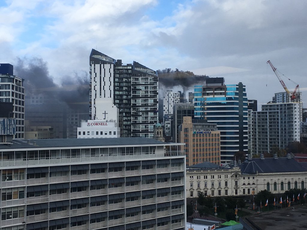 Jonnotie's tweet photo. @nzstuff Auckland. taken from floor 10 somewhere close by. You can see a ladder put up by firemen on the right. https://t.co/1p6wAYMig8
