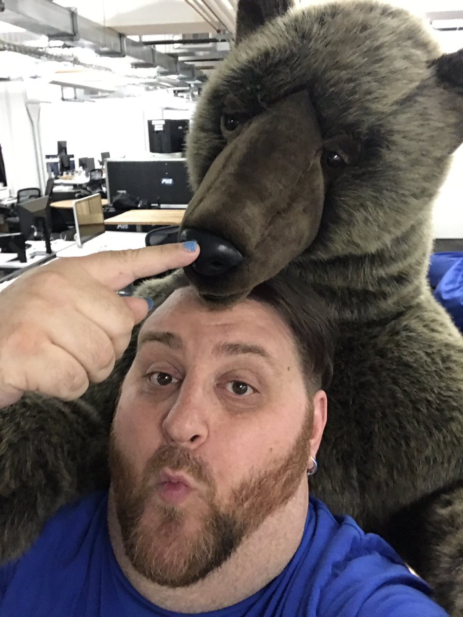 handler's tweet image. Today has obliterated my ability to respond coherently to anything, so instead have these pics of me and a friendly bear. #boop!