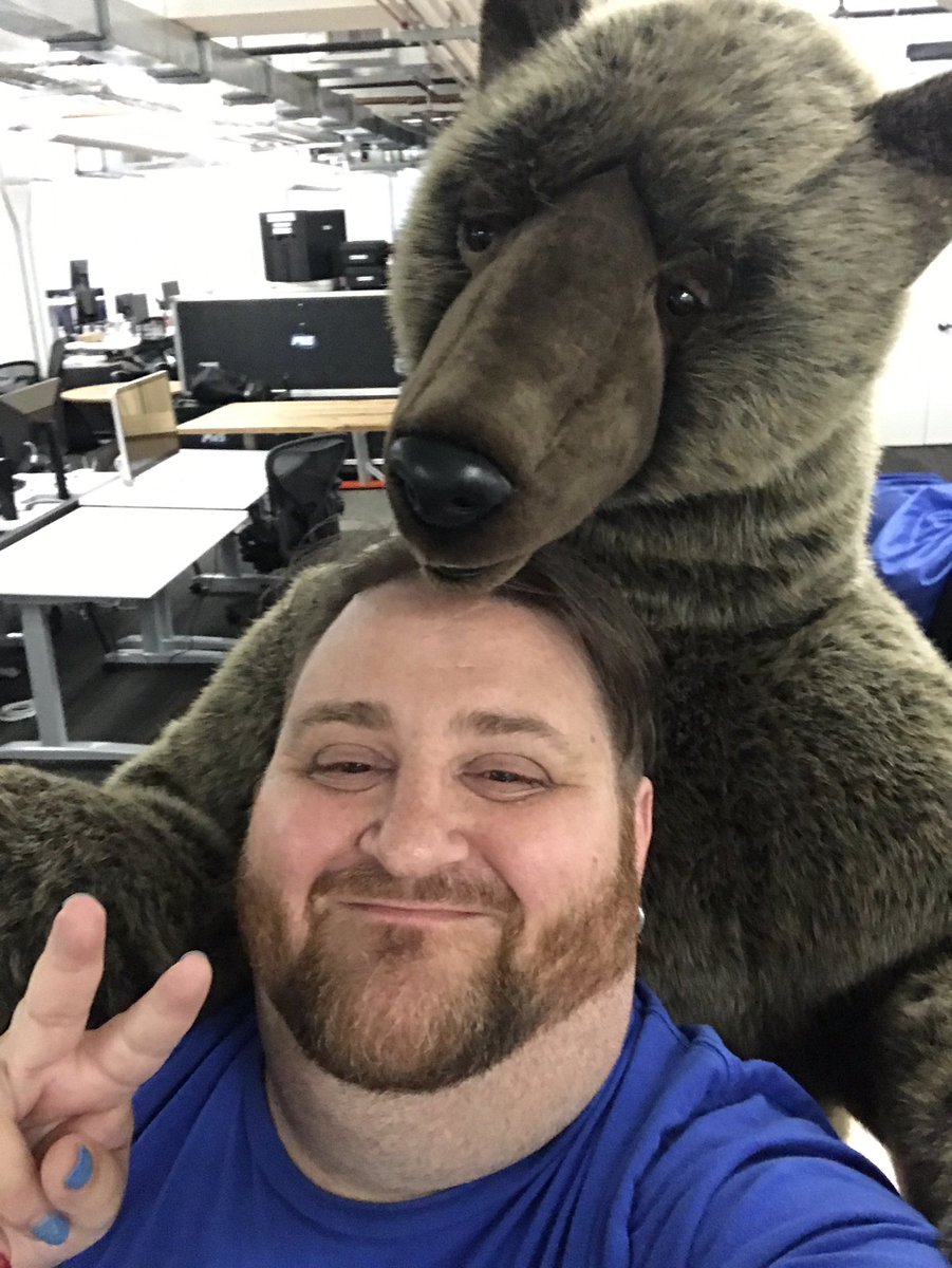 handler's tweet image. Today has obliterated my ability to respond coherently to anything, so instead have these pics of me and a friendly bear. #boop!