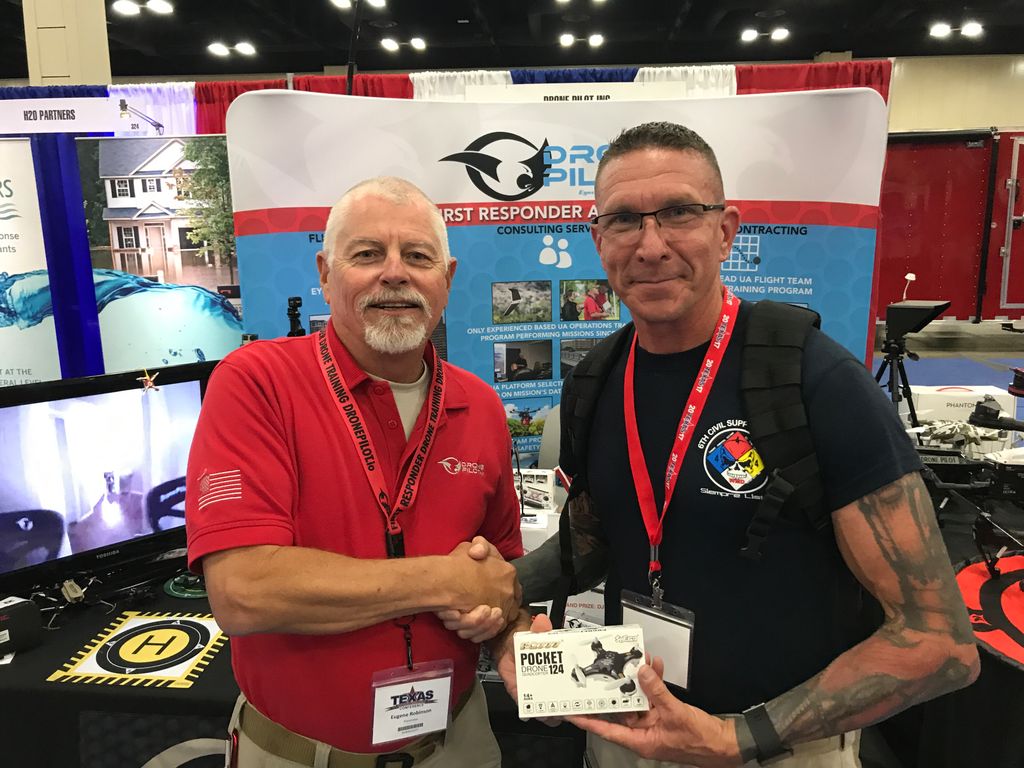 Dronepilotone's tweet photo. DPI congratulates TDEM 2017 Micro Drone Winners Day 2! Gene Robinson presenting! #tdem2017 https://t.co/QAaKK2j02E