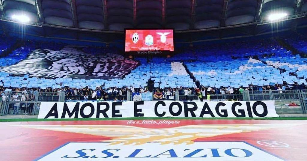 laziopress's tweet photo. 'Amore e Coraggio' #CURVANORD #FinalTimCup #Lazio https://t.co/QaVfh6NhHY