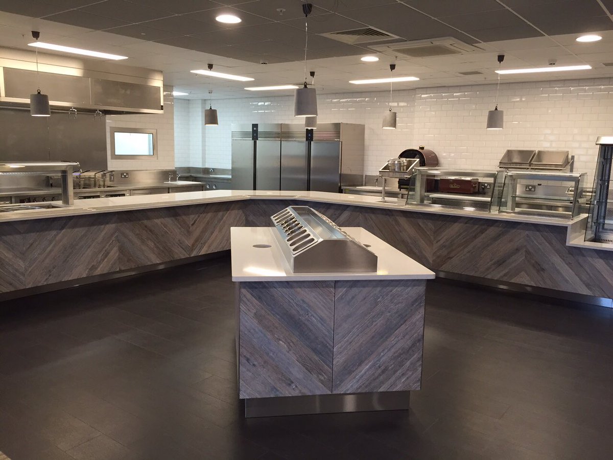 Reclaimed wood frontage &amp; stone tops