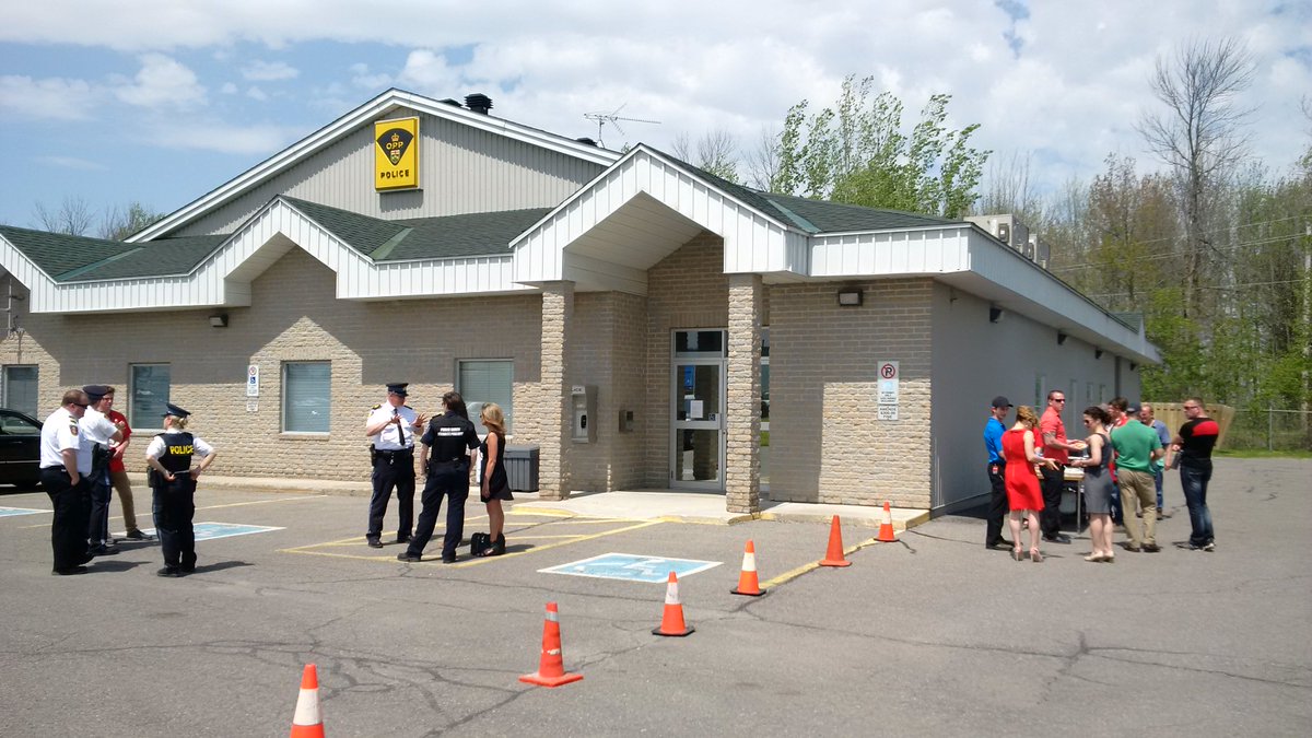 OPP_ER's tweet photo. A quiet minute at a BBQ at the Russell Cty OPP Det. Raising $$ for Prescott-Russell United Way. On until 2pm. https://t.co/udLdlzIT3s