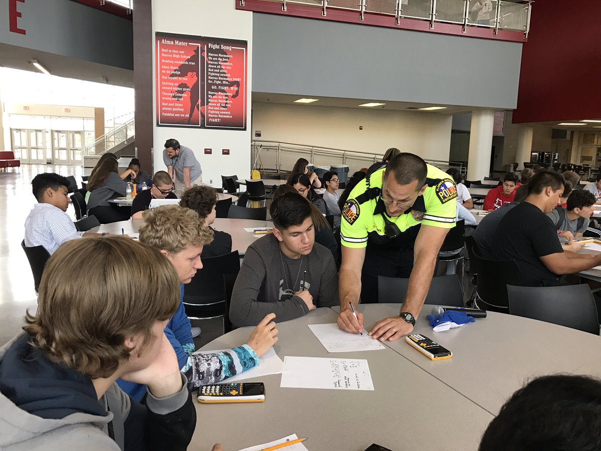 Kernse1's tweet photo. Officer Jahnke takes the time to teach MHS9 students how math will be used in traffic investigations. https://t.co/N8q1Rk00vV