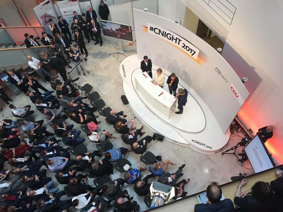 TauliaDE's tweet photo. Unser Gründer Maex @maex242 auf dem Podium mit Angela Merkel #Cnight #FinTech https://t.co/e8SYvBPlAX