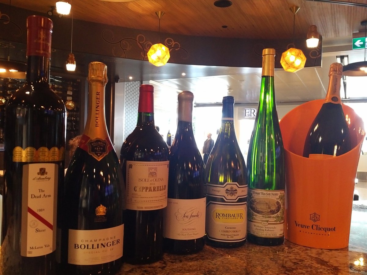 VinRoom's tweet photo. We like big bottles @VinRoom YYC. Just a few of our 60 magnums for your drinking pleasure #bubblesbeforeflight @FlyYYC #80winesbytheglass https://t.co/WODdPeZlNQ