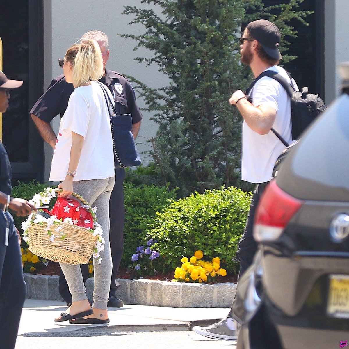 miamtimeline's tweet image. May 18th, 2017: Miley, Liam and Tish boarding their flight from Teterboro Airport in New Jersey (2/3)