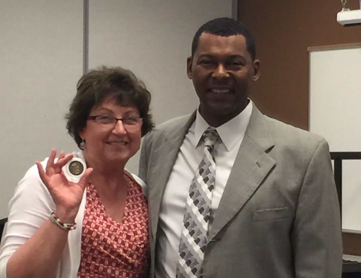 KentRayWilliam1's tweet photo. Secretaries Sue Burkhard and Teri Dobson receive Good Government Coins for Teamwork from Region 8 Manager Omar Alston. @MDOCOA9 https://t.co/fm0udmy1To