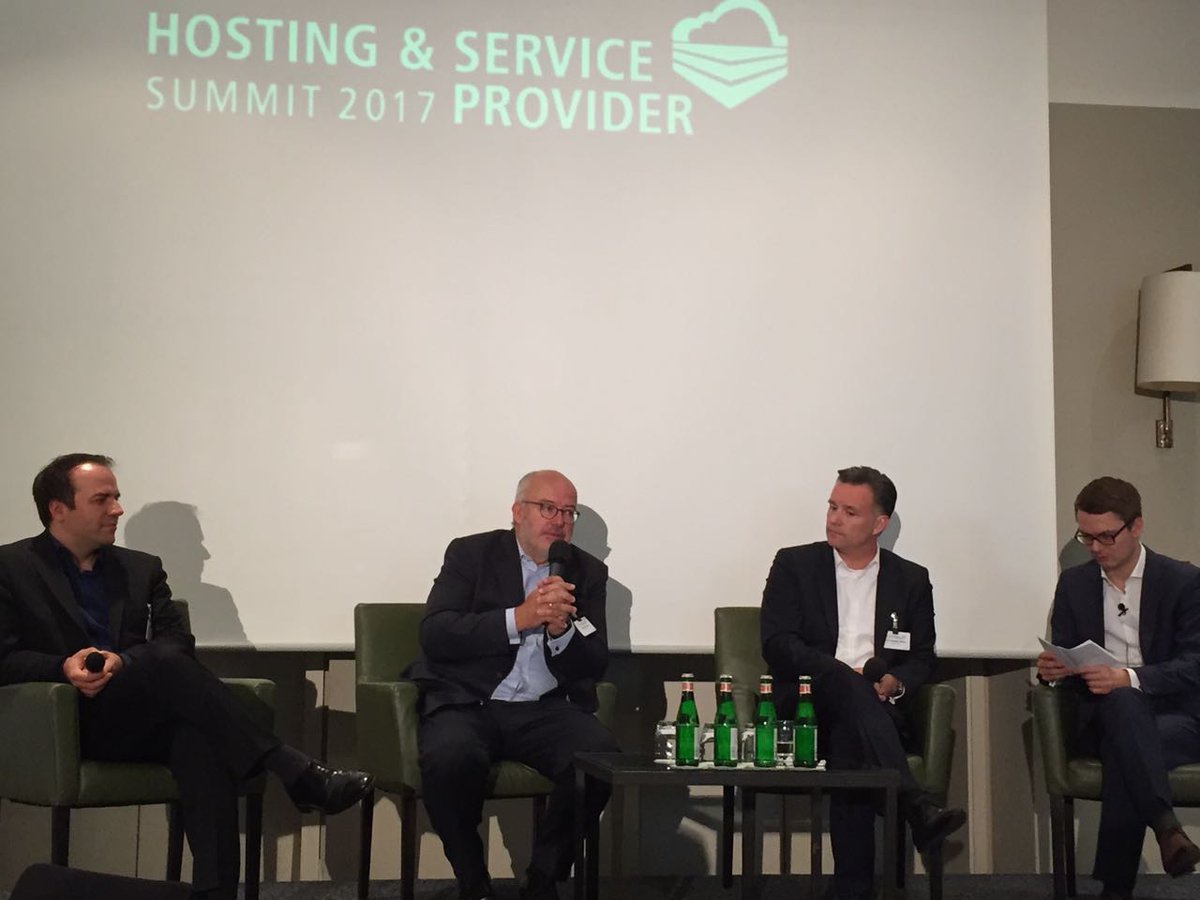 vogelitakademie's tweet photo. VIPs ON THE SPOT: Dr. Christian Böing, @STRATO_AG , Patrick Pulvermüller, @GoDaddy und Gerhard Sundt, SunCo auf dem Podium des #hspsummit https://t.co/EdCenkRMkA