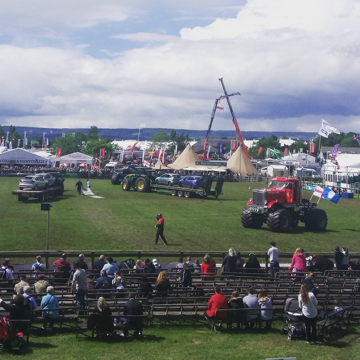 Monster trucks vs cars about to begin at <a href="/DevonCountyShow/">Devon County Show</a> in the main ring #devoncountyshow