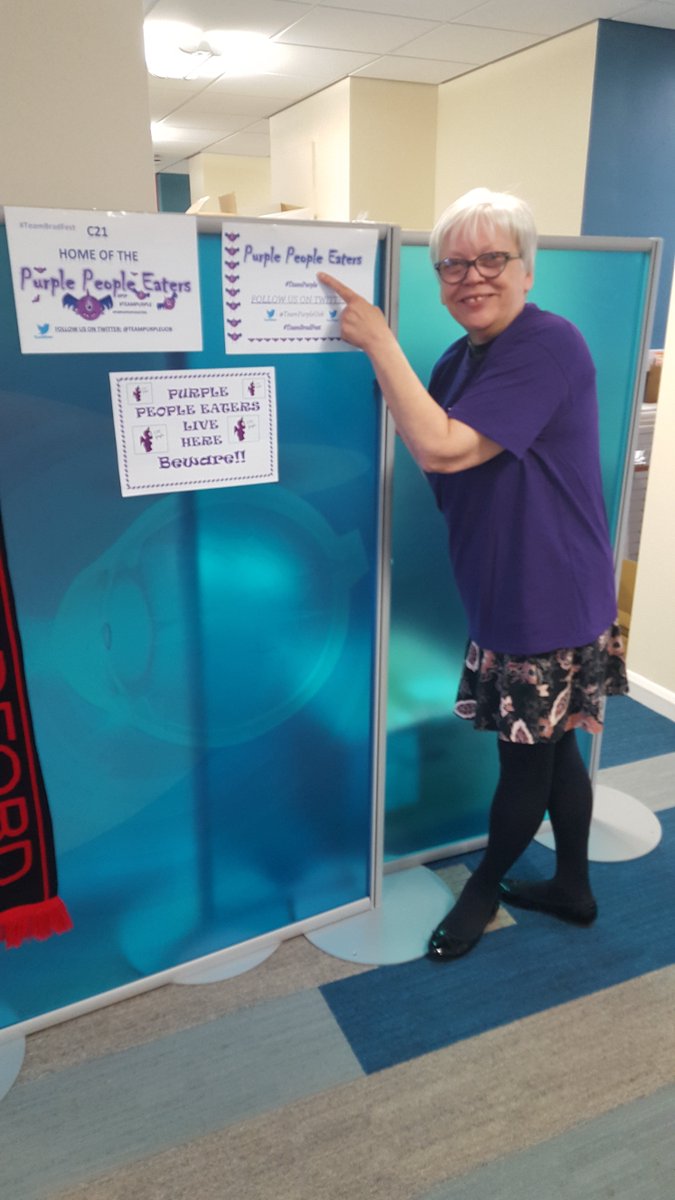 TeamPurpleUoB's tweet photo. The mighty Pauline, pointing out who to support to avoid a roundhouse kick to the face! #teampurple #teambradfest https://t.co/8oG8Bp0Kzr
