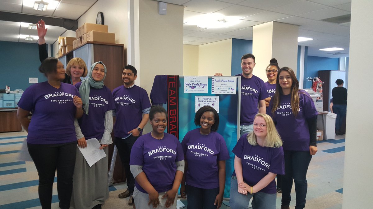 TeamPurpleUoB's tweet photo. The person behind the glorious social media campaign for #teampurple is in this picture! As is a #teamyellow minion #photobomb #mystery https://t.co/b1cn7x3sbD