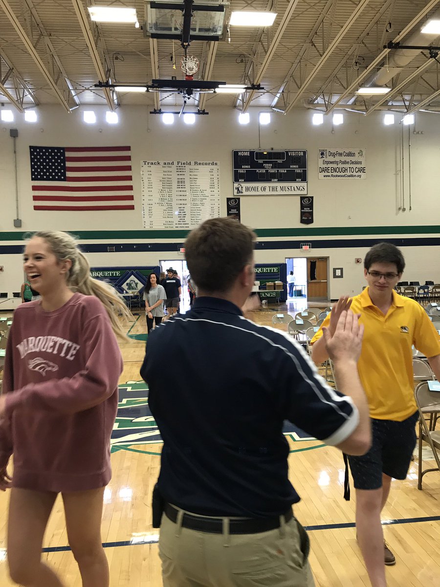 MHSPrincipal's tweet photo. Who needs a handshake when you can high five graduates? #SeniorClass2017 https://t.co/CmssR5txnC
