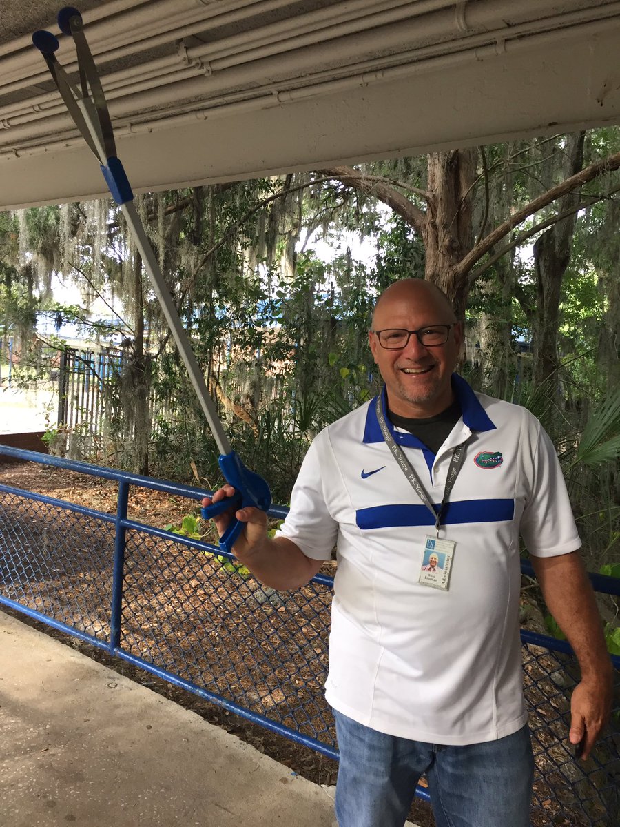 CarrieGeigerPKY's tweet photo. A man of many talents: Today he is a defender against the rogue raccoon. #ilovemyjob #floridwildlife #multipurposetool https://t.co/8tMSieg9Dd