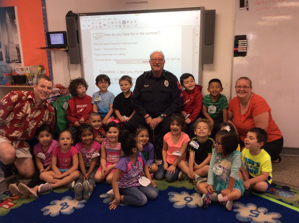 HeadStartCFDP's tweet photo. Officer Hurst reading to children in Grand Island to celebrate Head Starts 52nd Birthday!#CommunitiesRead https://t.co/qjQbpJETca