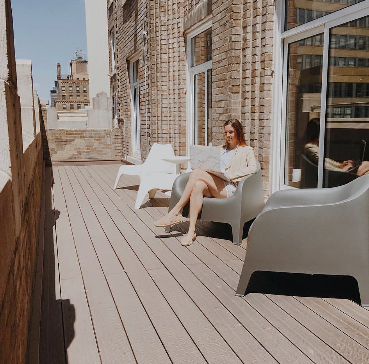 WorkVilleNYC's tweet photo. Work doesn't have to interfere with your tanning π #coworking #workville #nyc #startup #entrepreneurship #terraces https://t.co/1F1CmkZM8V