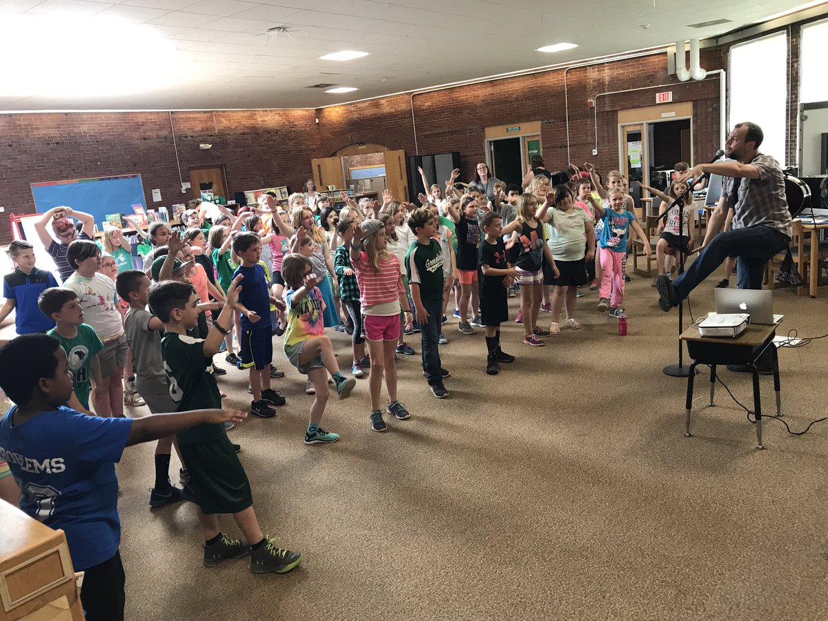 JakeToomeyHR's tweet photo. It's Fun Friday! Ask your child about our special guest @AlastairMoock who shared messages of social justice through music! @Super_GPS https://t.co/XyvjoZ3Mao