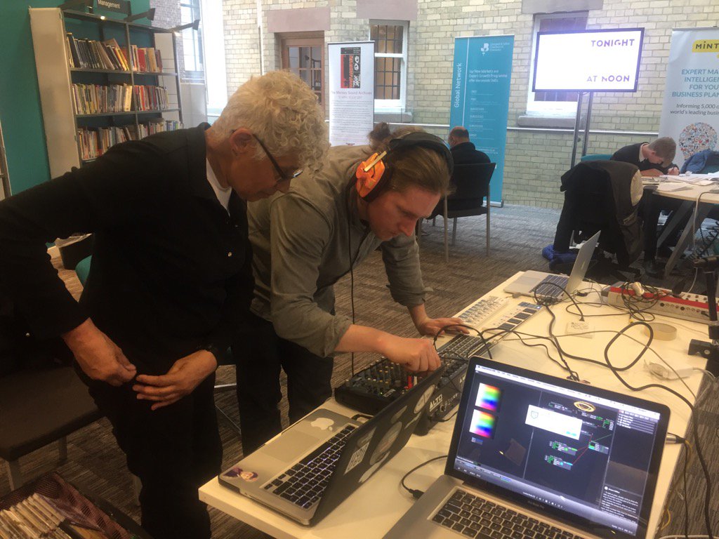 Rewind_FF's tweet photo. Sandi and Sam setting up for a fantastic #LightNight in Liverpool @Liverpoollib https://t.co/36eNxfccKo