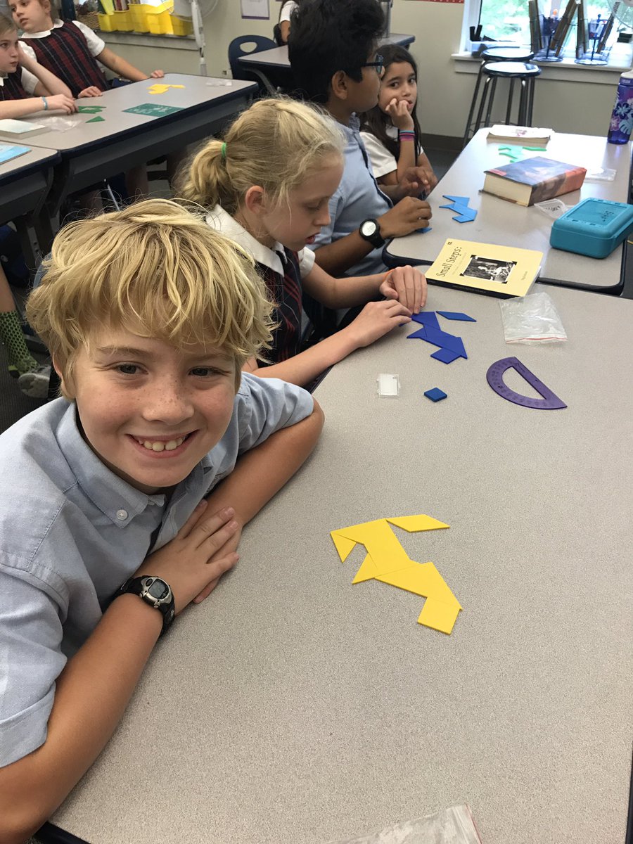 dawnrobins71's tweet image. Students take a break computation as they explore the use of tangrams. These students created a lion to show school spirit.