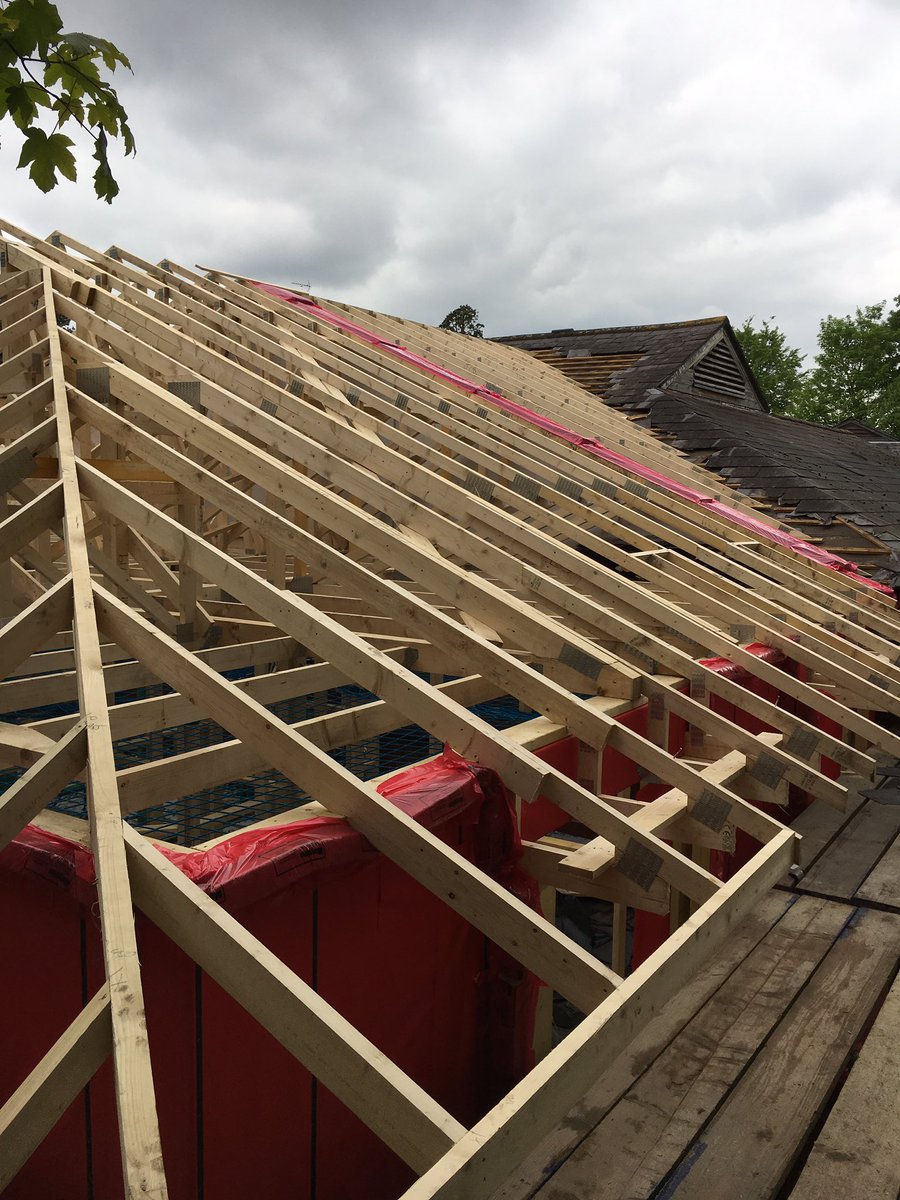 TropicalKJB's tweet photo. Massive effort in the rain but we got this extension up in 4 days with 3 men thanks Tom &amp; Matt #timberframe @FrameTechStruct https://t.co/s2X8BHtPi9