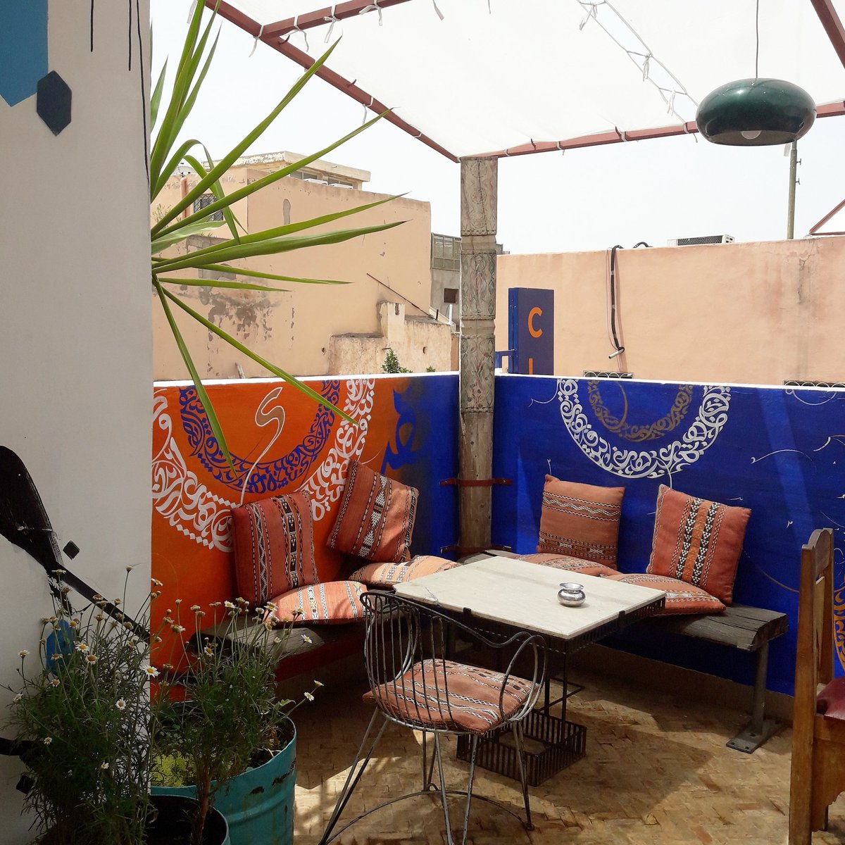 MandyinMorocco's tweet photo. Loving the new calligraffiti installation in my favourite cafe in the Marrakech medina #CafeClock #Marrakech #pragency #Morocco https://t.co/p6ERCubEJG
