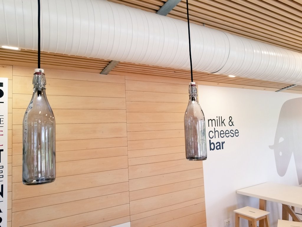 Of course at a #Milk and #Cheese bar, you have to have milk bottles as lights. At <a href="/mljekara/">Mljekara Latus</a> in #Istria #Croatia. #LuxuryTravel #ShareIstria